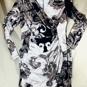 Jennifer Lopez Blue, Black Gray and Cream Swirl Dress